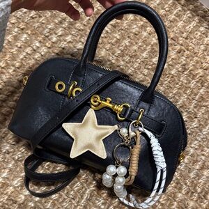 Elegant Black Handbag with Gold Accents